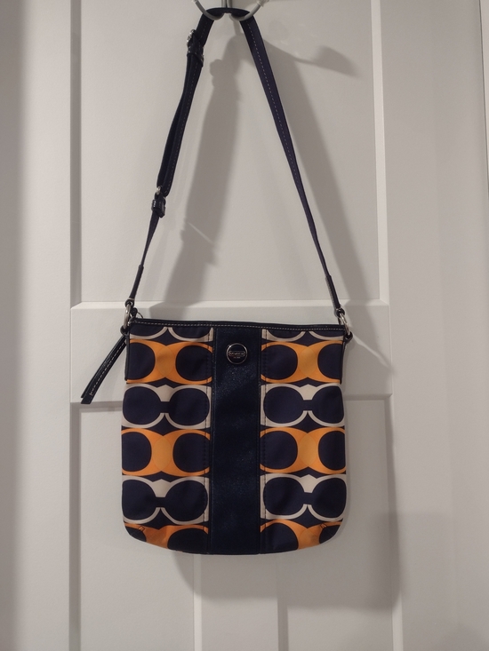 Coach Handbags - Coach Navy and Orange Signature Monogram Circle Crossbody Bag